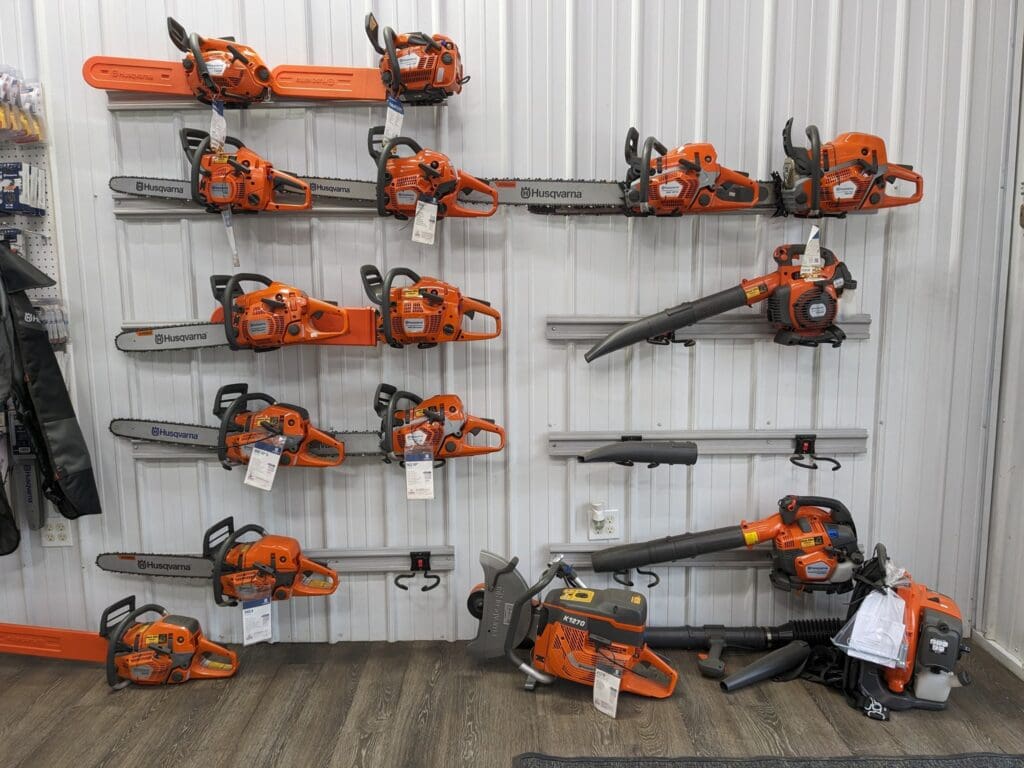 Husqvarna chainsaws, leaf blowers, and power tools displayed for sale at Black Hills Husqvarna in Spearfish, SD.