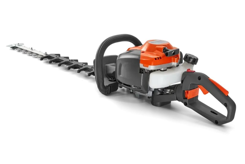 Husqvarna hedge trimmer with long dual-action blades and orange housing, displayed on a white background.